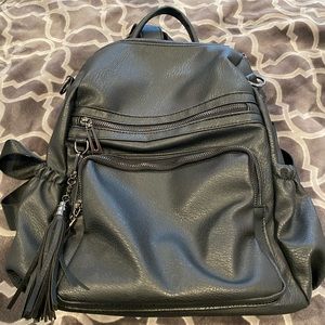Black backpack tons of pockets good quality.